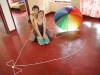 Us inside the heart with rainbow umbrella