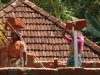 Women carying bricks