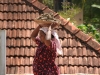 Women carying bricks