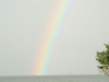 Rainbow above the water - the sea is calling us!