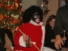 Mama Negra - the Santa Claus version of Ecuadors coast arrives with a helper