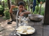 Linda grinding boiled yucca