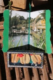 Selfmade handicraft made of jacaranda flowers and leaves